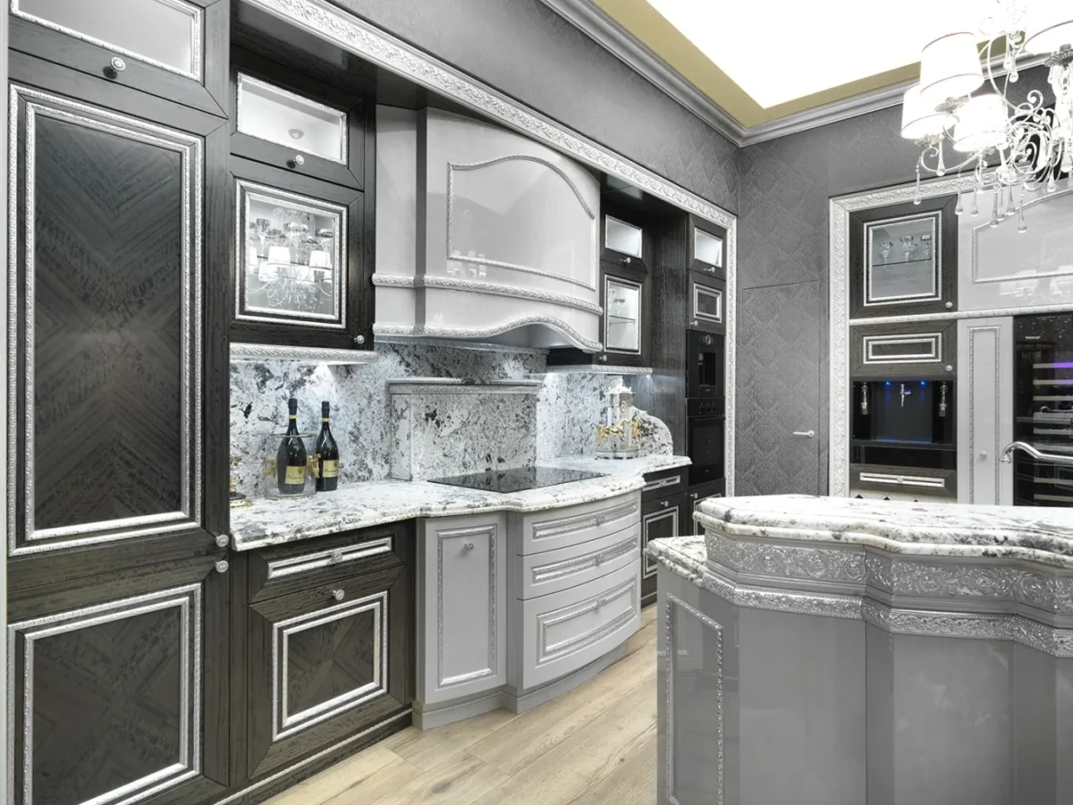 Contemporary luxury Italian kitchen in grey and silver with a marble island